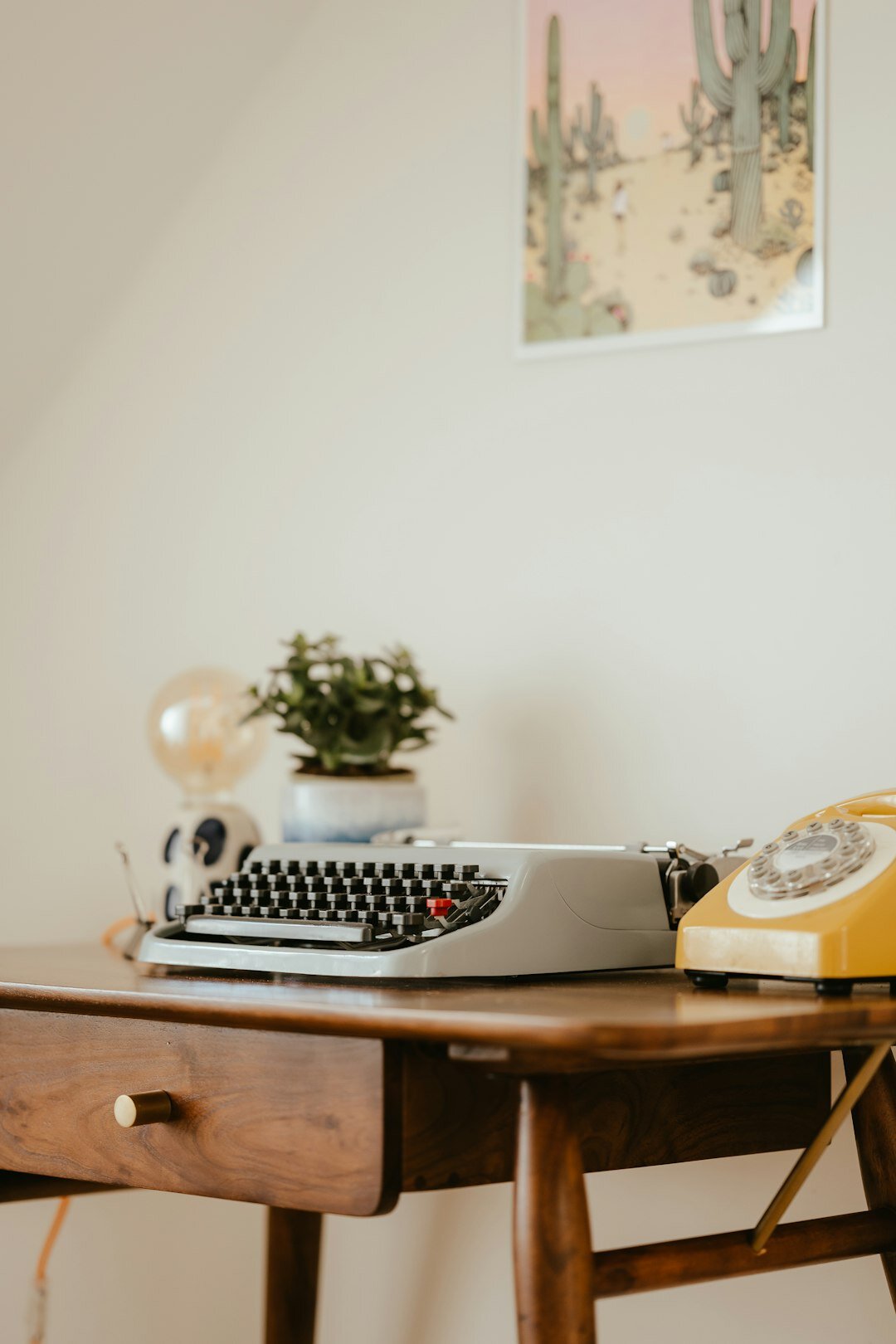 old typewriter on wooden table