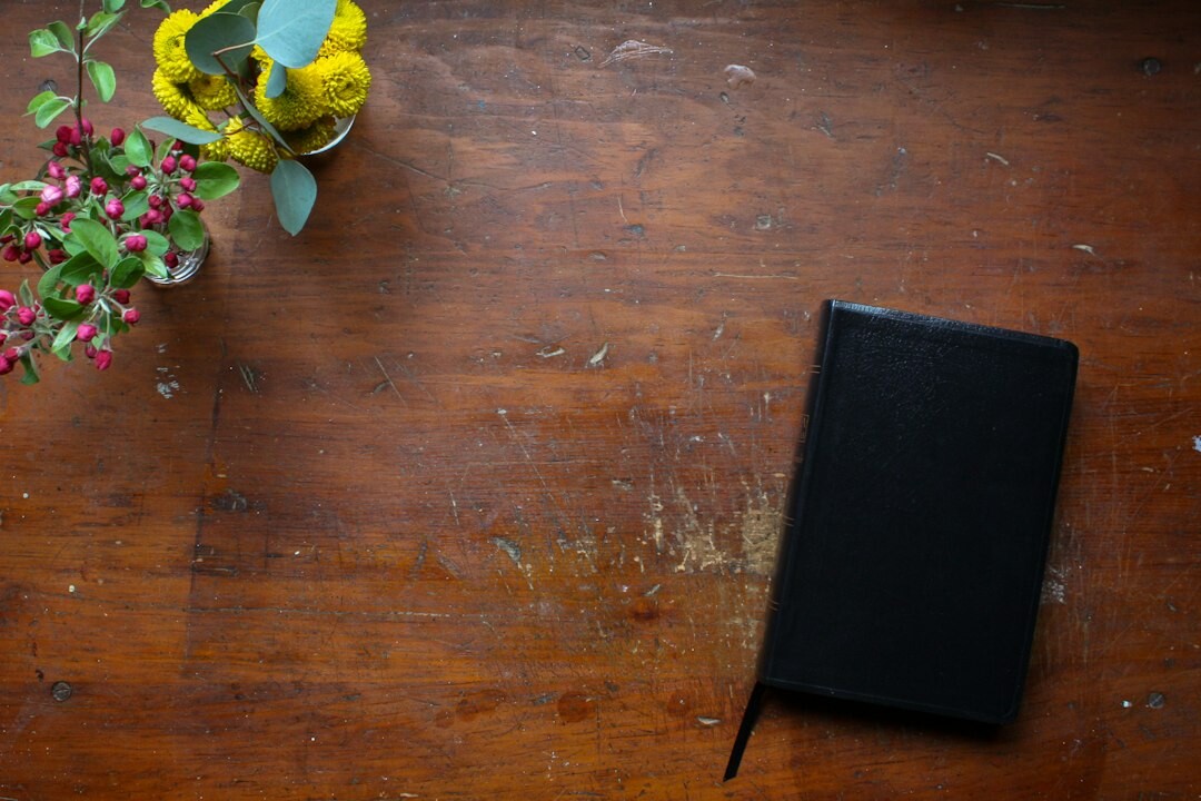 open book on wooden table